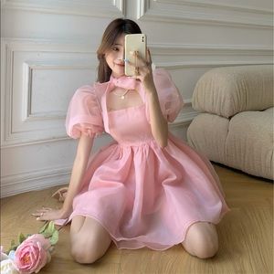 pink puff sleeve dress with tie